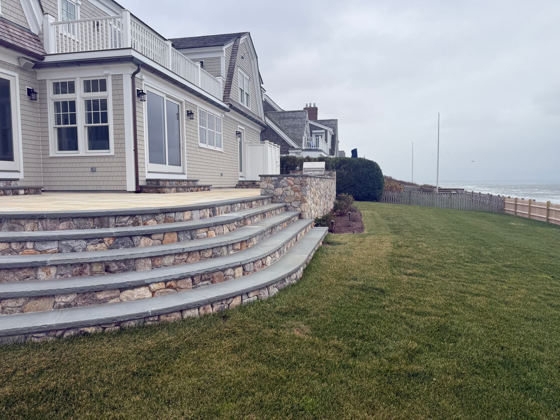 New England Stone Steps and Tiered Patio with Coastal Views in Dennis MA