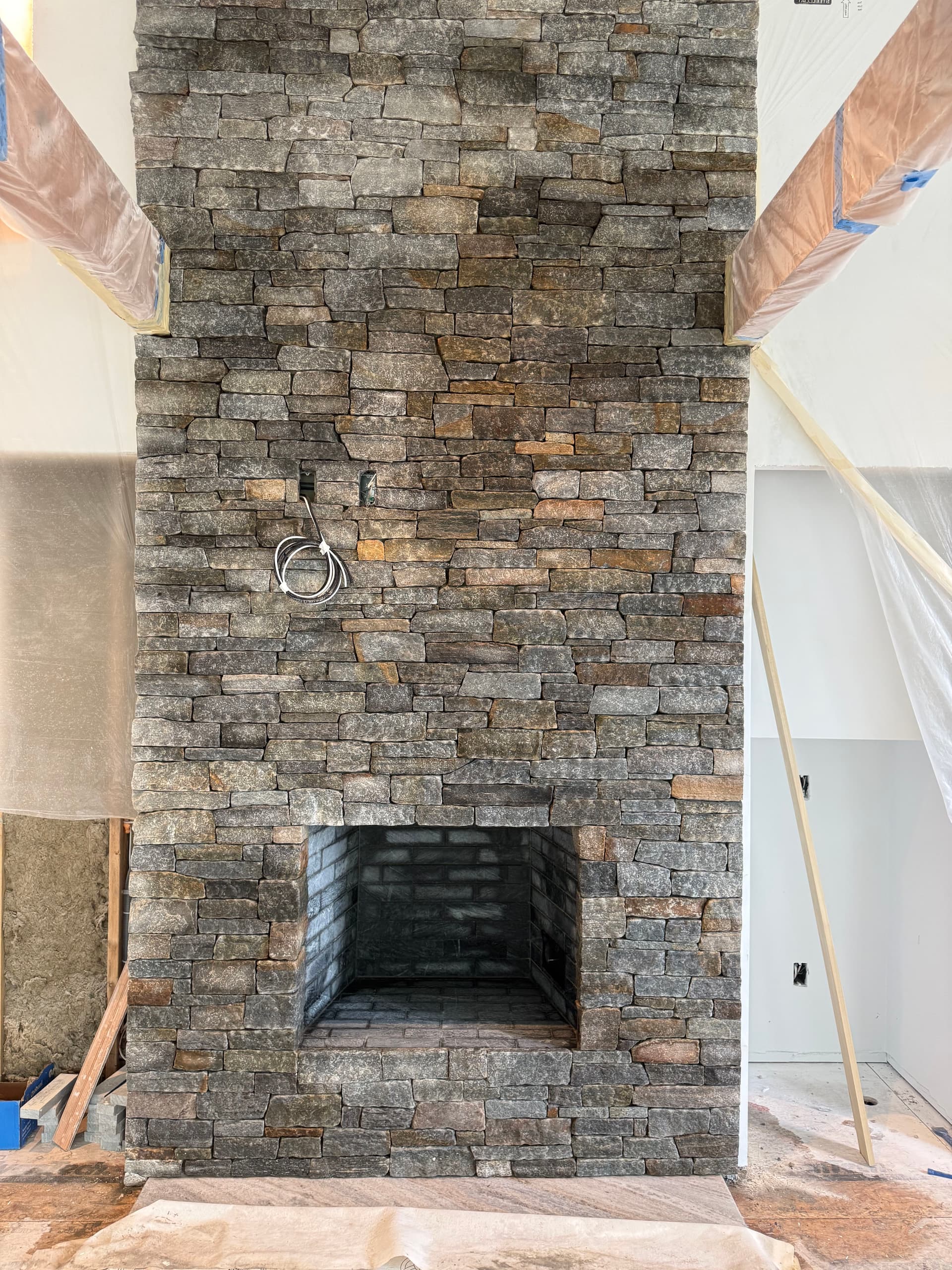 Gallery photos for Boston Blend Stone Veneer Fireplace Taking Shape: Image #1