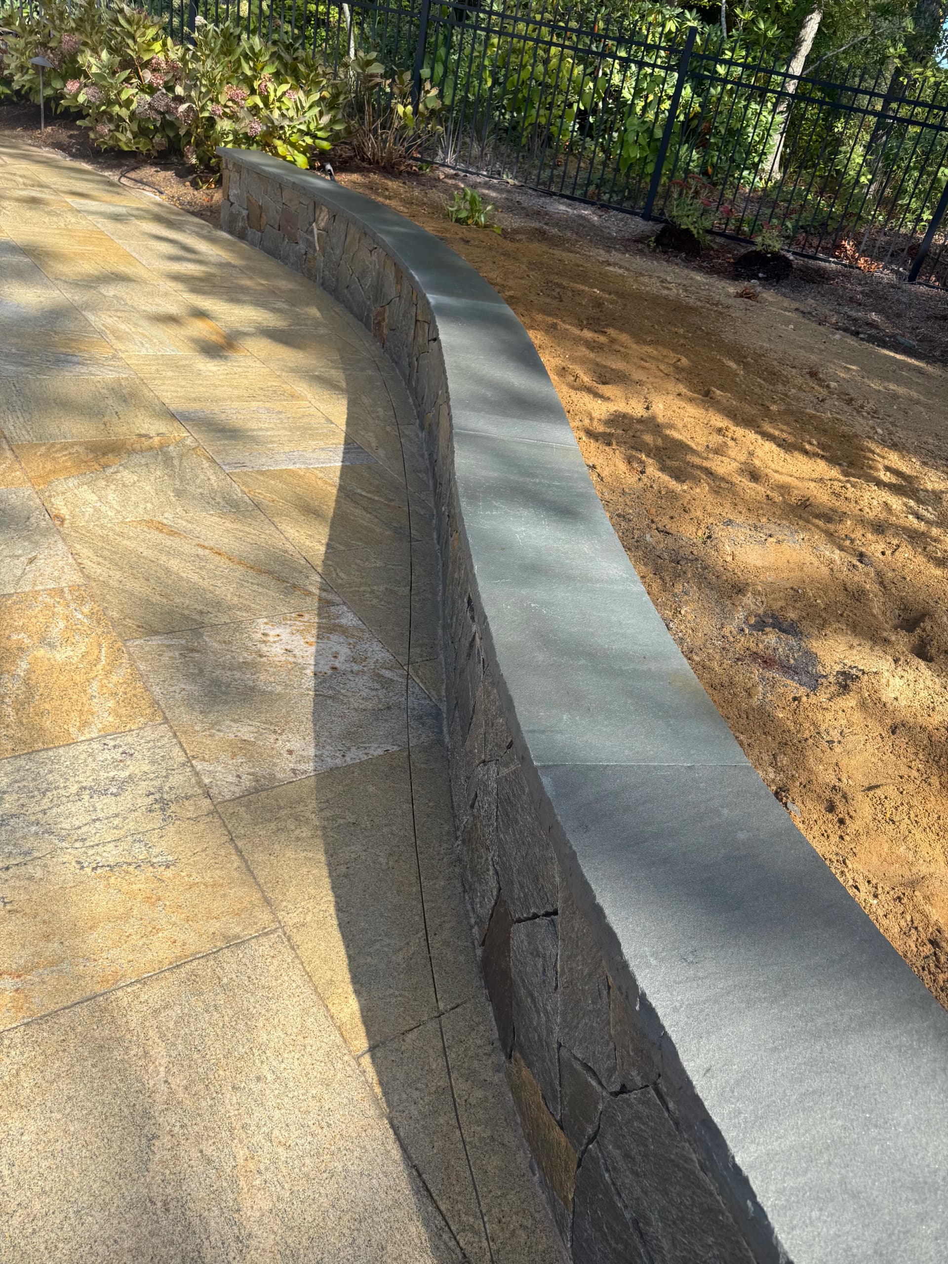 Gallery photos for Pool Patio Sitting Wall Built with Noble Hill Stone and Thermal Blue Caps: Image #1