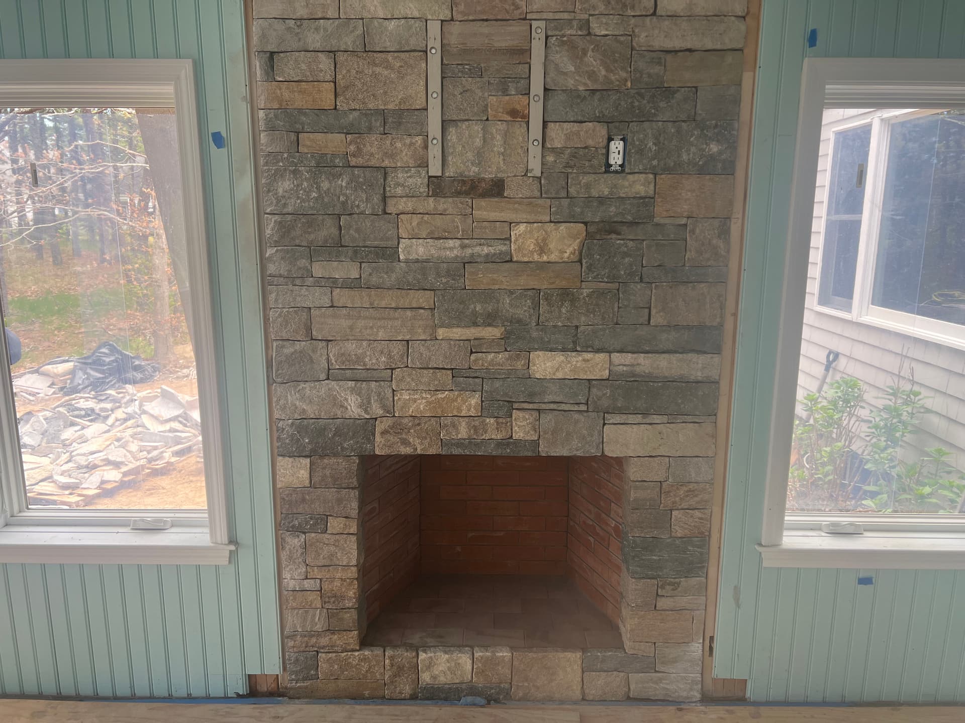 Cape Cod Addition Gets a Full Stone Fireplace Build image