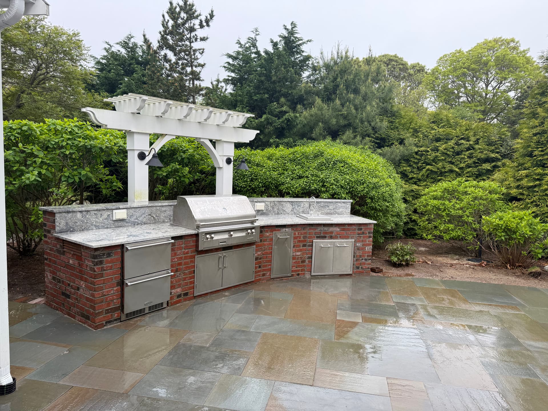 Cape Cod Bluestone Patio with Fire Pit and Outdoor Kitchen image